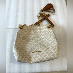 White brown gold Michael Kors multiple pockets bag